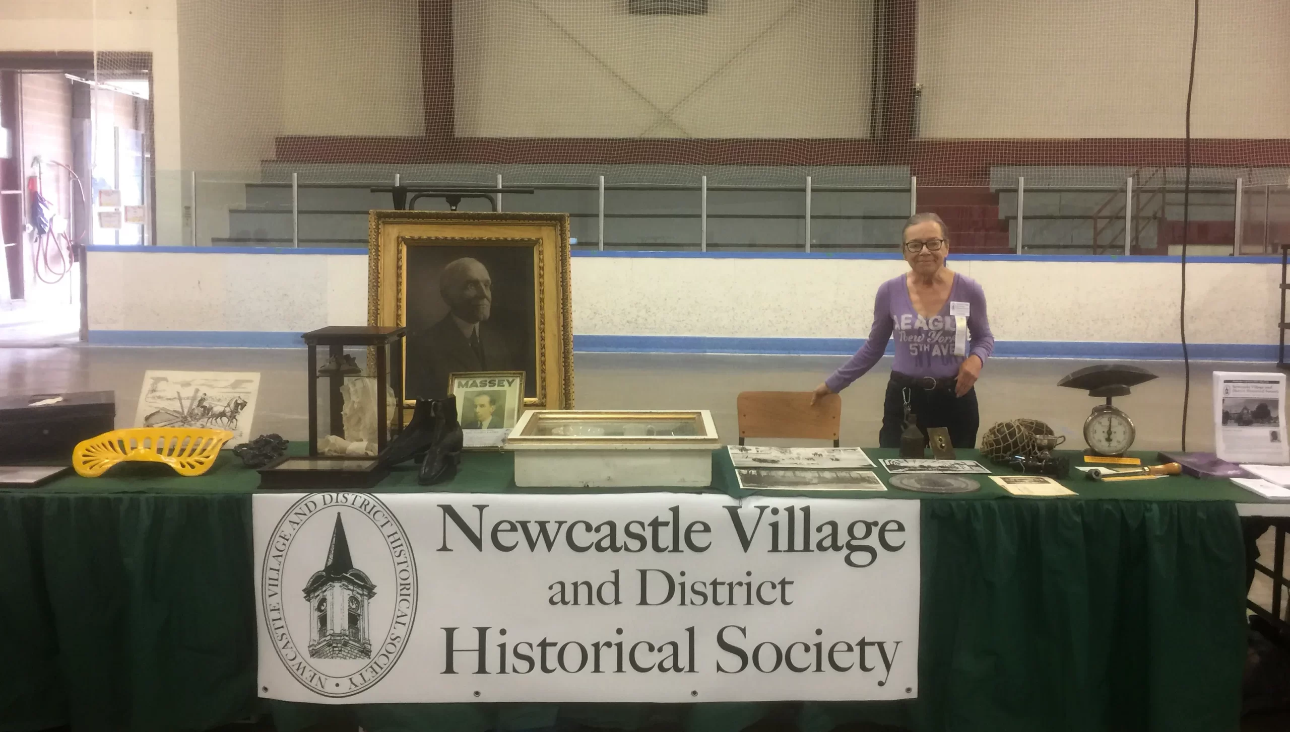 Newcastle Village and District Historical Society table displaying artifacts at Orono Fair